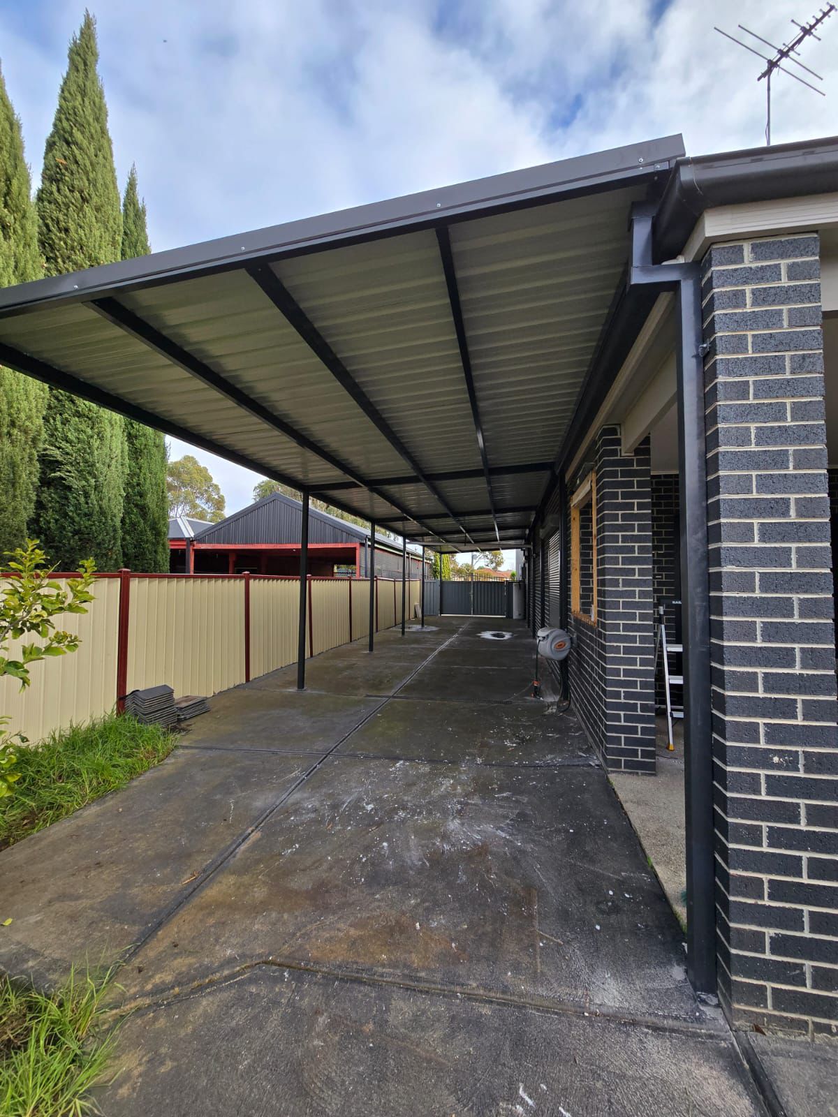 Before: Side carport to decked walkway